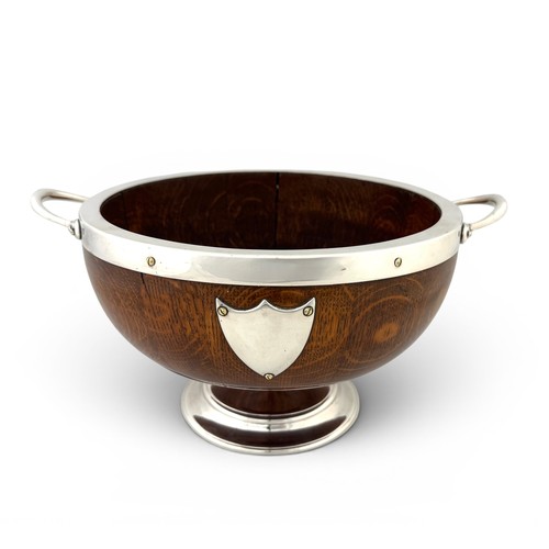 650A - A Mappin & Webb silver plated wooden trophy pedestal bowl with vacant cartouche. Diameter 24cm.