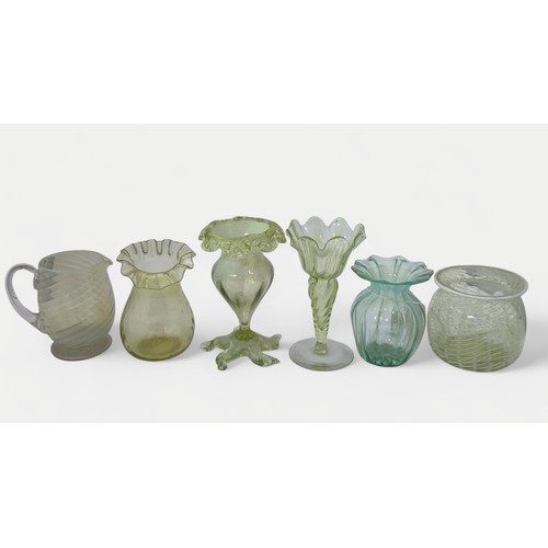 644A - Victorian Vaseline glass range including two stemmed vases, three posy vases and a pourer. (6)