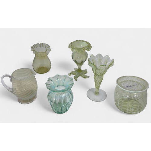 644A - Victorian Vaseline glass range including two stemmed vases, three posy vases and a pourer. (6)