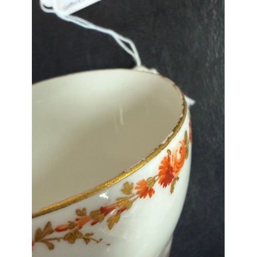 546 - A Meissen porcelain lidded cup and saucer, en grisaille painted decoration of peasant figures in lan... 