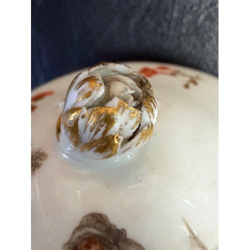 546 - A Meissen porcelain lidded cup and saucer, en grisaille painted decoration of peasant figures in lan... 