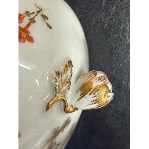546 - A Meissen porcelain lidded cup and saucer, en grisaille painted decoration of peasant figures in lan... 