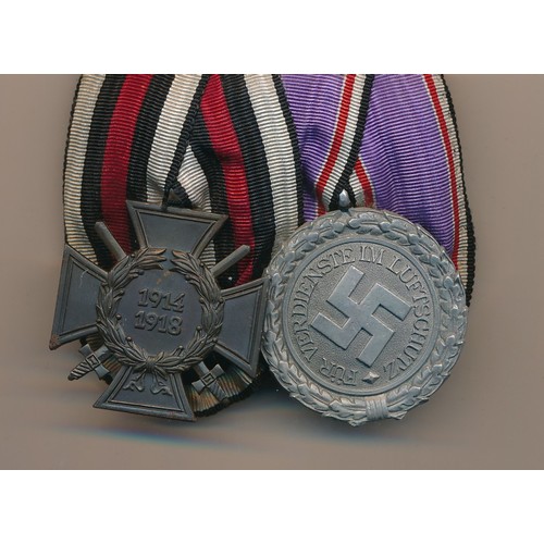 532 - German medal pair with 1914-18 Hindenburg Cross and Third Reich Civil Defence 2nd Class Medal, mount... 