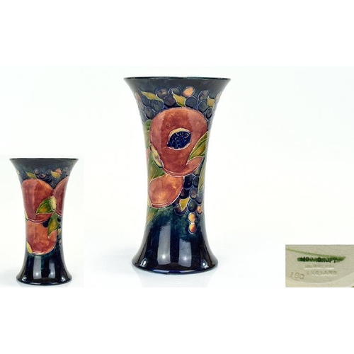 495 - William Moorcroft Signed Trumpet Shaped Vase ' Pomegranates and Berries ' Design. c.1920's. 8.5 Inch... 