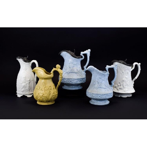 614 - A Good Collection of Early to Mid 19th Century Moulded Jugs / Pitchers. Various Factories ( 5 ) Five... 