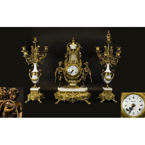 1110 - A 20th Century Brass And Marble Cased Clock Garniture In the Louis XV style, the movement by EHS of ... 