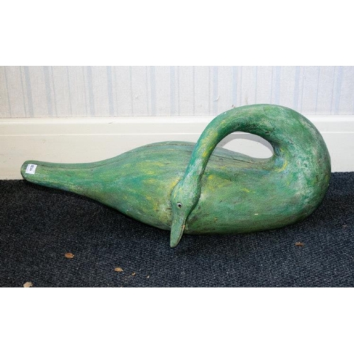 1130 - A Life Size Green Painted Wooden Swan, realistically  modelled. Length 30 inches.