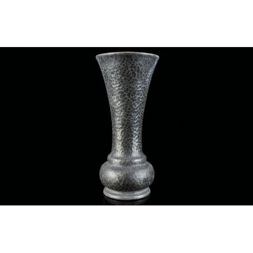 1233 - A Tudric Hammered Pewter Trumpet Vase Of plain form, marked to base 01415, good condition, height, 7... 