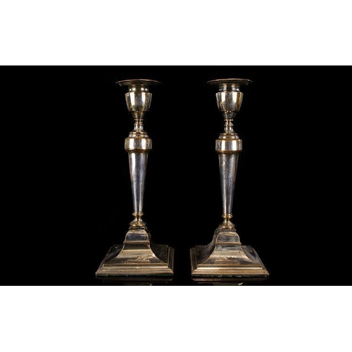 1237 - Antique Plated Metal Candlesticks A pair of white metal candlesticks of neoclassical form with squar... 