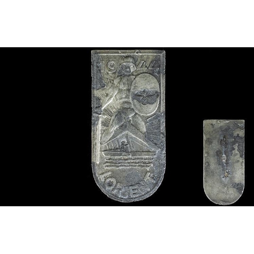 1322 - WWII Interest German 1944 Lorient Arm Shield cast metal shield depicting German soldier with swastik... 