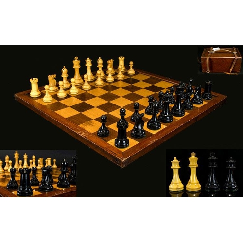 1450 - Staunton Boxwood and Ebony chess set, Three rooks and two knights stamped with a red crown, stained ... 