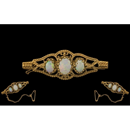 198 - Ladies 9ct Gold 3 Stone Opal Set Ornate Brooch, with attached safety chain, with full hallmark for 9... 