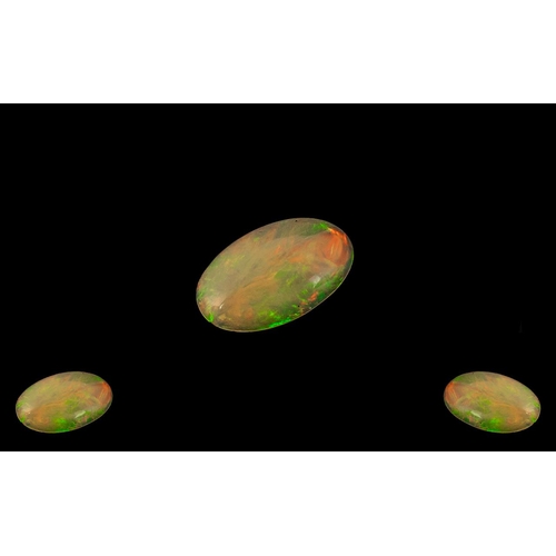 217 - Ethiopian Natural Orange Fire Oval Shaped Opal. Wonderful Colours. Measurements 15.6 x 9.3 x 4.3 mm.... 