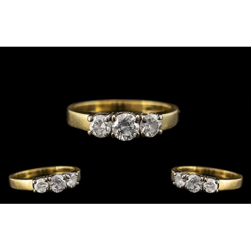 41 - 18ct Yellow Gold - Attractive 3 Stone Diamond Set Dress Ring. Full Hallmark for 18ct - 750. The Roun... 