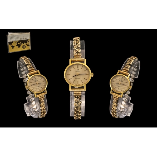 74 - Ladies Omega Wristwatch Gilt Striped Dial With Baton Numerals, Manual Wind. Gold Plated 20 x 23mm Ca... 