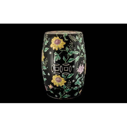 820A - Oriental Pottery Garden Stool with famille noir decorations; 18 inches (45cms) high x 12 inches (30c... 