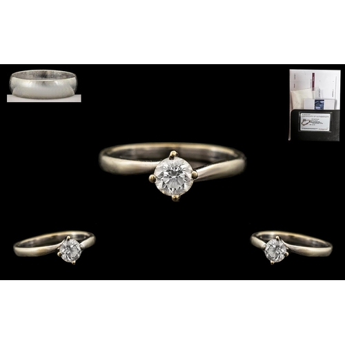 86 - 18ct Single Stone Diamond Ring round modern cut diamond in a 4 claw setting together with IGI diamon... 