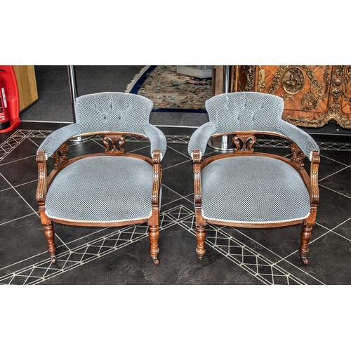 1043 - A Pair of Victorian Tub Chairs with padded back rests, arms and seats. Carved supports on turned leg... 