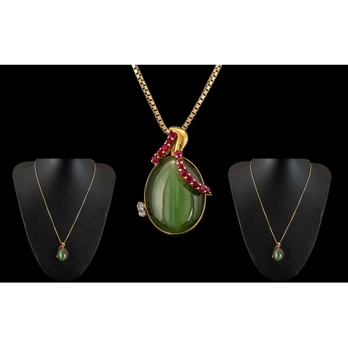 204 - 18ct Gold - Ruby and Diamond Set Jade Brooch - Pendant, Attached to a Long Box, 9ct Gold Chain. The ... 