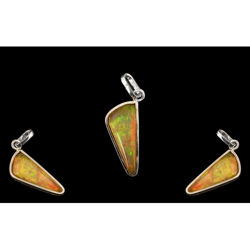 216 - Ethiopian Natural Orange Fire Opal, Wonderful Colours. 4.92 cts Weight - 0.88 grams. Measurements 23... 