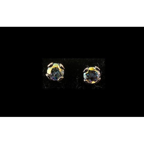 316 - Mercury Mystic Topaz Stud Earrings, each earring comprising a round cut topaz of over 1.5cts, with t... 