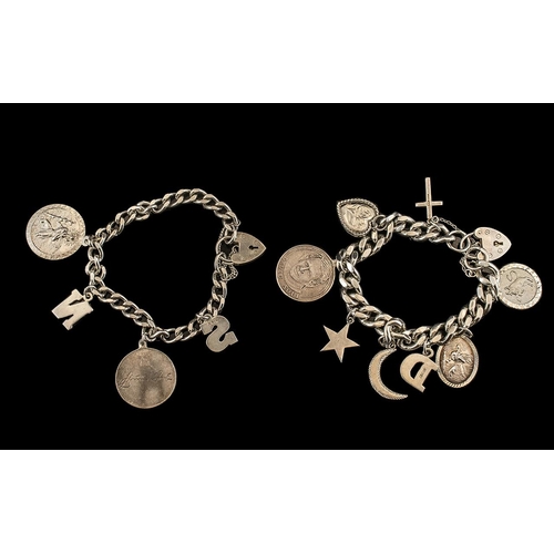 325 - Two Silver Charm Bracelets with various medallions and trinkets attached, with heart shaped locks; 3... 