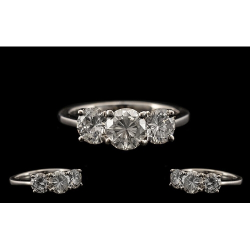 71 - 18ct White Gold Superb Quality 3 Stone Diamond Ring.  Fully hallmarked 18ct - 750.  The three modern... 