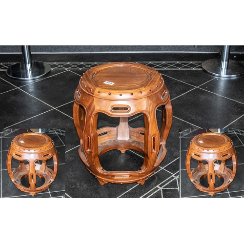 804 - Chinese Hardwood Barrel Shaped Stool with five shaped, internal bowed legs, supported on a platform ... 