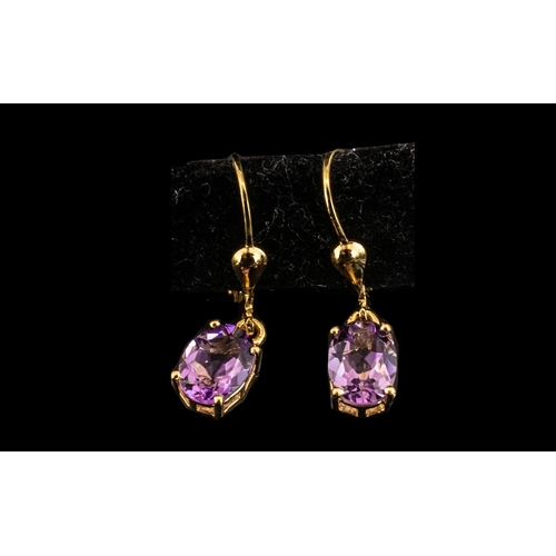201A - Amethyst Solitaire Drop Earrings, The Oval Cut Amethysts Totalling 2.25 cts, Set In Gold Vermeil and... 