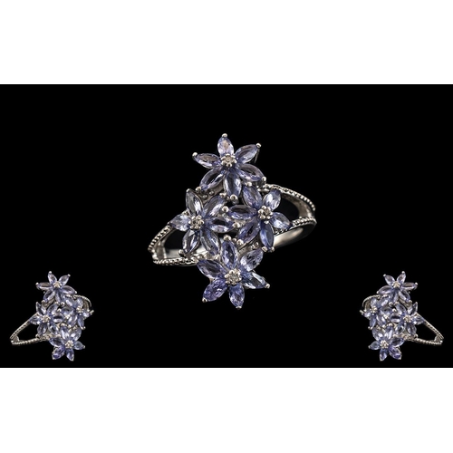 206 - Tanzanite Starflower Cluster Ring, A Cluster of Four Starflower's, Made up of Marquise Cut Tanzanite... 