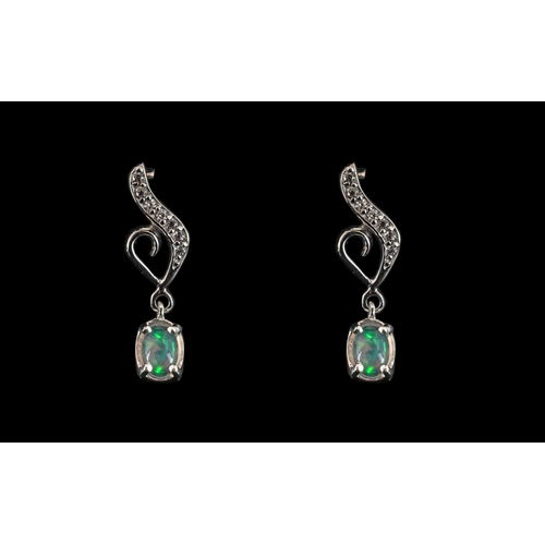 211 - Natural Opal Drop Earrings, Solitaire Oval Cut Opals, Suspended from Decorative Rhodium Vermeil and ... 