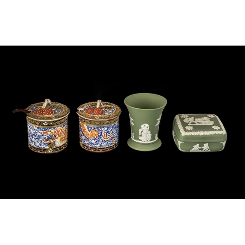 696 - A Pair of Japanese Preserve Jars a moulded lid with strawberries, hand painted dragons. Together wit... 