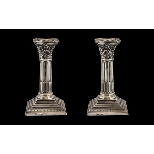 103 - Edwardian Period Fine Pair of Sterling Silver Classical Corinthian Column Candlesticks on Raised Ste... 