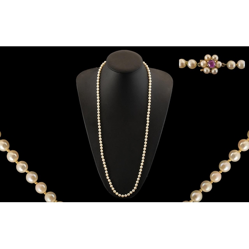 65 - A Ladies Good Quality Single Strand Cultured Pearl Necklace with 9ct Gold Clasp, set with pearls and... 