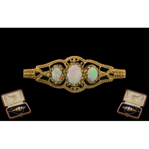 77 - Antique Style 9ct Gold Attractive Opal Set Ornate Brooch with Attached Safety Chain. The Opals of Go... 