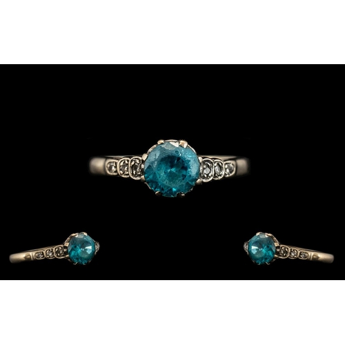 85 - 18ct Aquamarine & Diamond Set Ring in White Gold.  Aquamarine stone approx. 1 ct, flanked with diamo... 