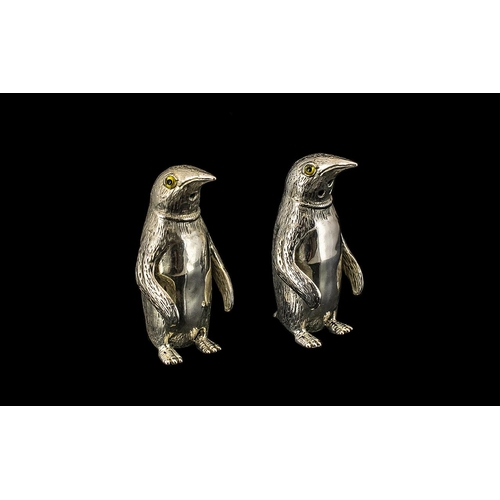 136 - A Pair of Silver Novelty Salt and Pepper Pots In the Form of Penguins. Marked 800 Silver. Each Stand... 