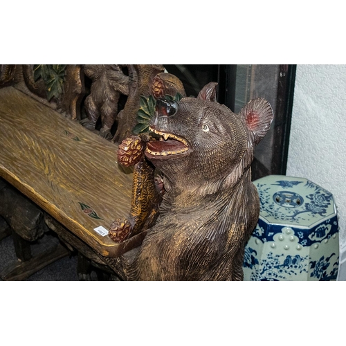 1083 - Black Forest Type 20thC Bear Hall Bench of carved and painted wood, with two bears supporting the se... 