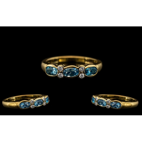 34 - 18ct Gold - Attractive Aquamarine and Diamond Set Ring of Pleasing Design. Full Hallmark for 750 - 1... 