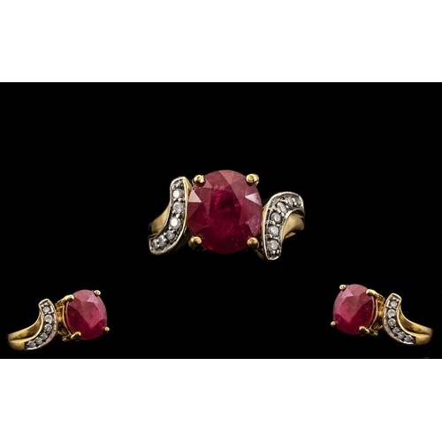 80 - Ladies 18ct Yellow Gold - Attractive Ruby and Diamond Set Ring. The Central Faceted Ruby Flanked by ... 