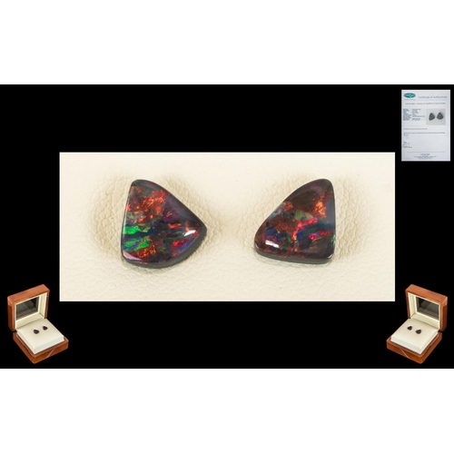 95 - Lightning Ridge Loose Black Opals.  A pair of natural black Opals .  2.97 cts, Triangular free form,... 