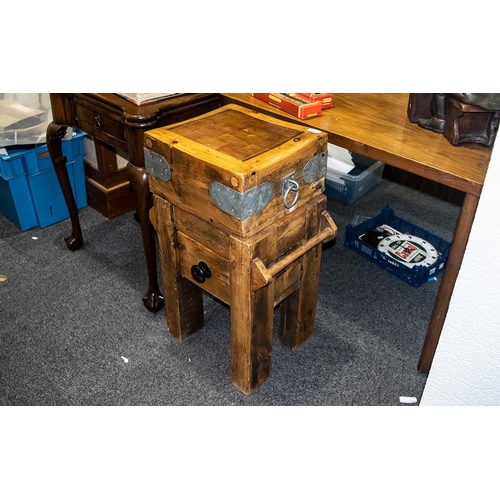 1080 - Small Sized Butcher's Block, refinished on a pine base with a drawer, the block metal mounted with r... 