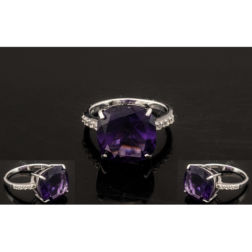 282 - Amethyst Solitaire Ring, the 9ct square cushion cut amethyst, of a rich Royal purple colour, measure... 