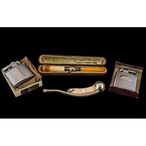 260 - Miscellaneous Lot comprising two vintage Ronson chrome cased petrol lighters, bosun's whistle and ca... 