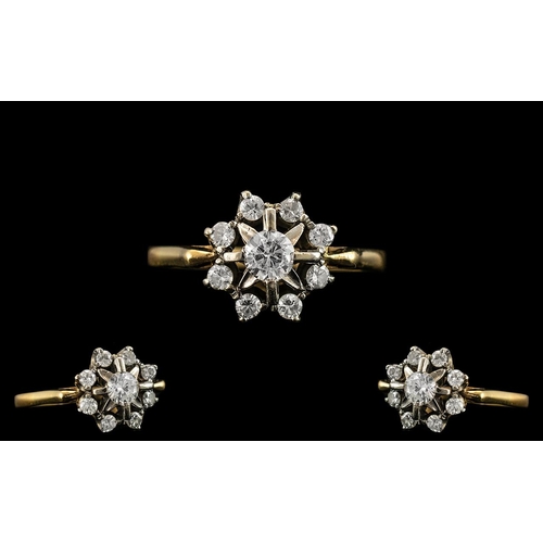 21A - 18ct Gold and Platinum Attractive Diamond Set Cluster Ring of Pleasing Design. The Larger Central Di... 