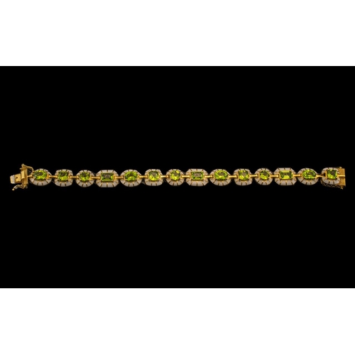 271 - Peridot and White Enamel Line Bracelet, alternating square, round, elongated octagon and oval cuts o... 