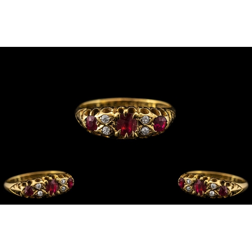 43 - Edwardian Period 18ct Gold Attractive Ruby and Diamond Set Ring - Gallery Setting. The Three Faceted... 