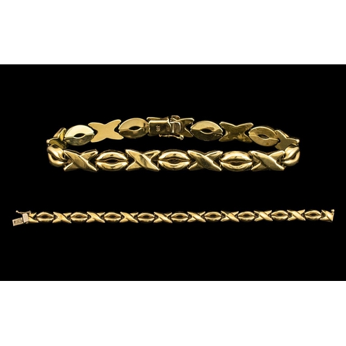 79 - Contemporary 9ct Gold O and X Designed Bracelet with Good Clasp. Fully Hallmarked for 9.375. Excelle... 