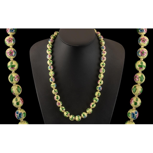 138 - Chinese Enamel Bead Necklace.  Over 20'' in length, beautifully decorated throughout.  Please see im... 