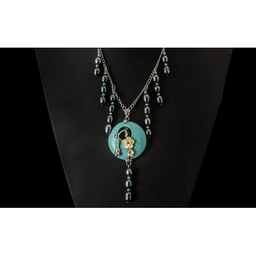 300 - Turquoise Blue Howlite and Fresh Water Peacock Pearl Necklace, a graduated fringe necklace of peacoc... 